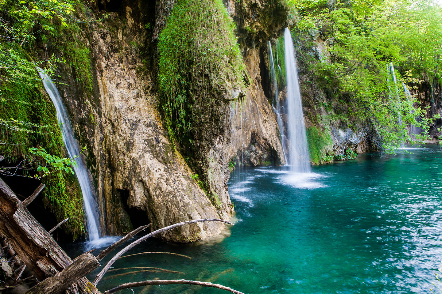 Plitvice Lakes National Park, Croatia Waterfalls ending in an emerald pool in the Plitvice Lakes National Park, Croatia