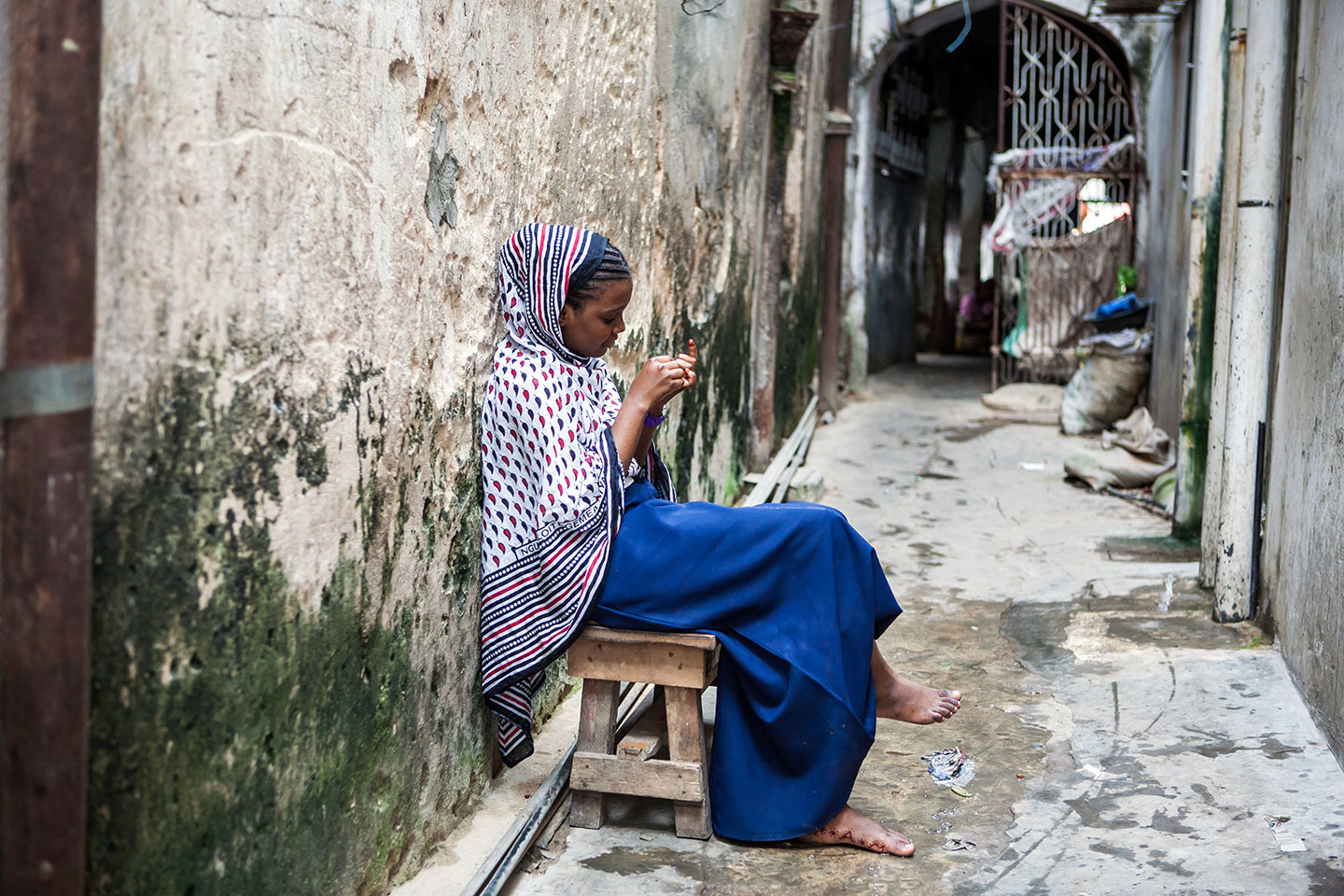 Stone Town, Zanzibar A young girl in the streets of Stone Town, Zanzibar