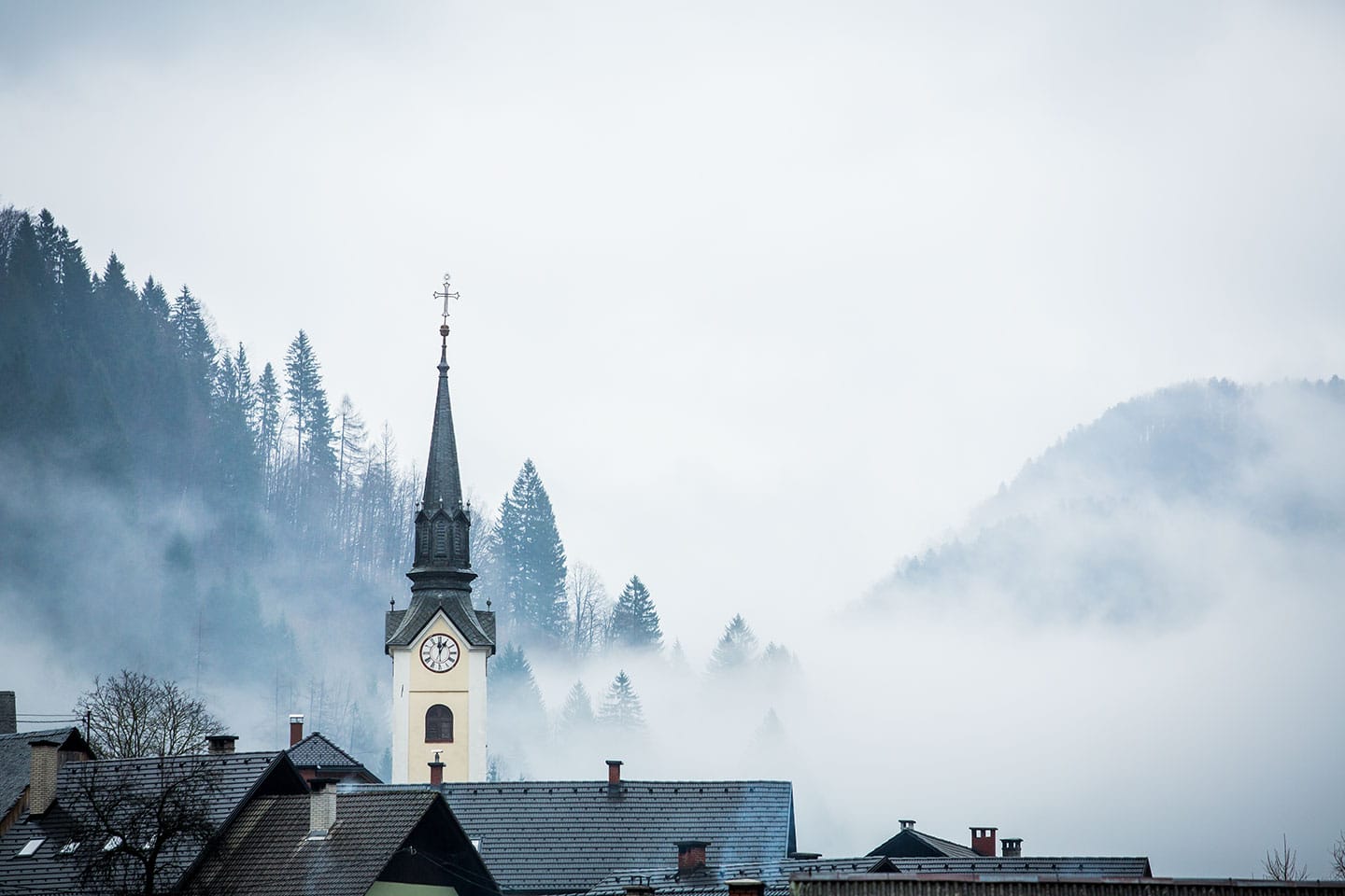 Central Slovenia A church tower in the mist in Slovenia