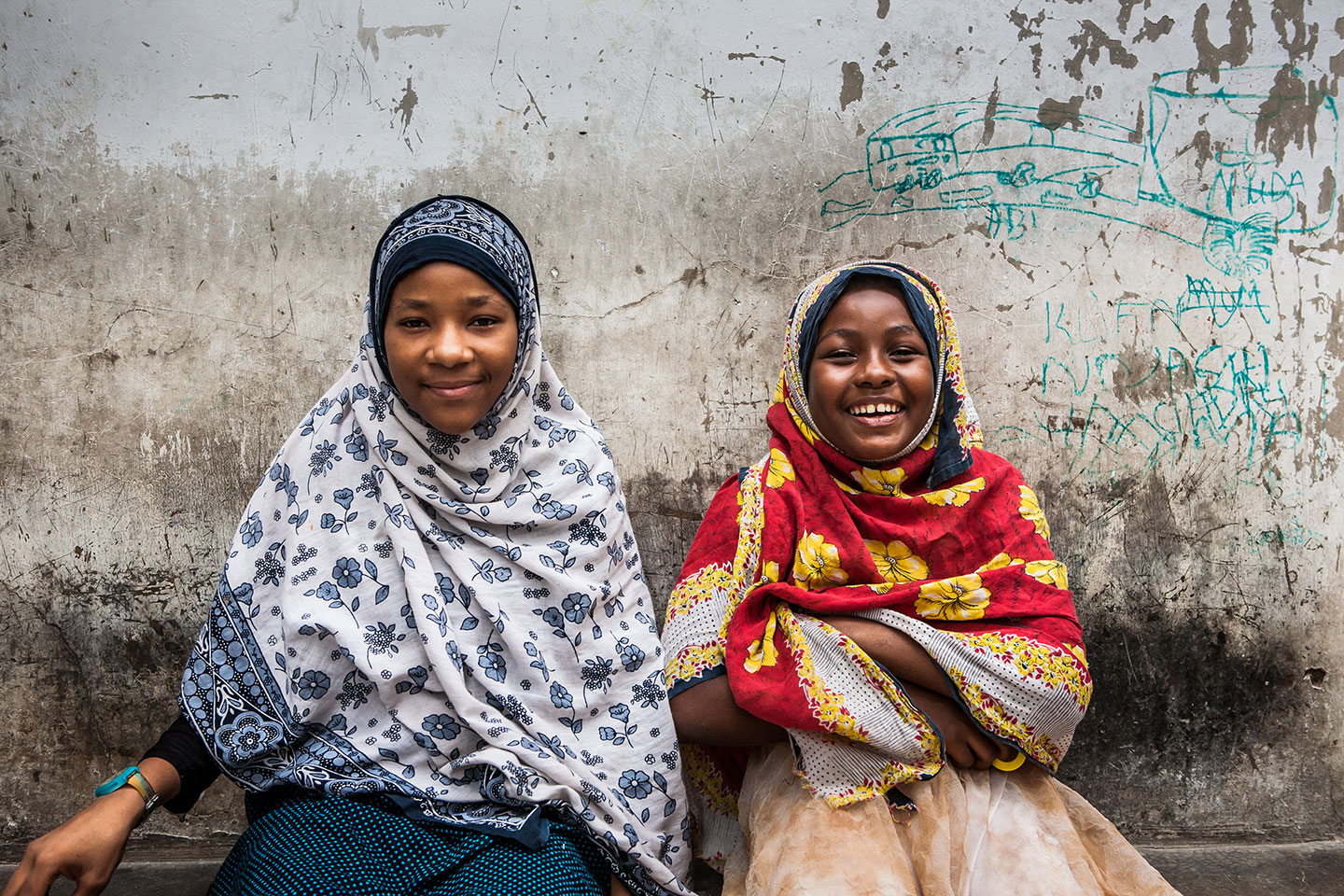 Stone Town, Zanzibar Two young muslim girls in the streets of Stone Town, Zanzibar