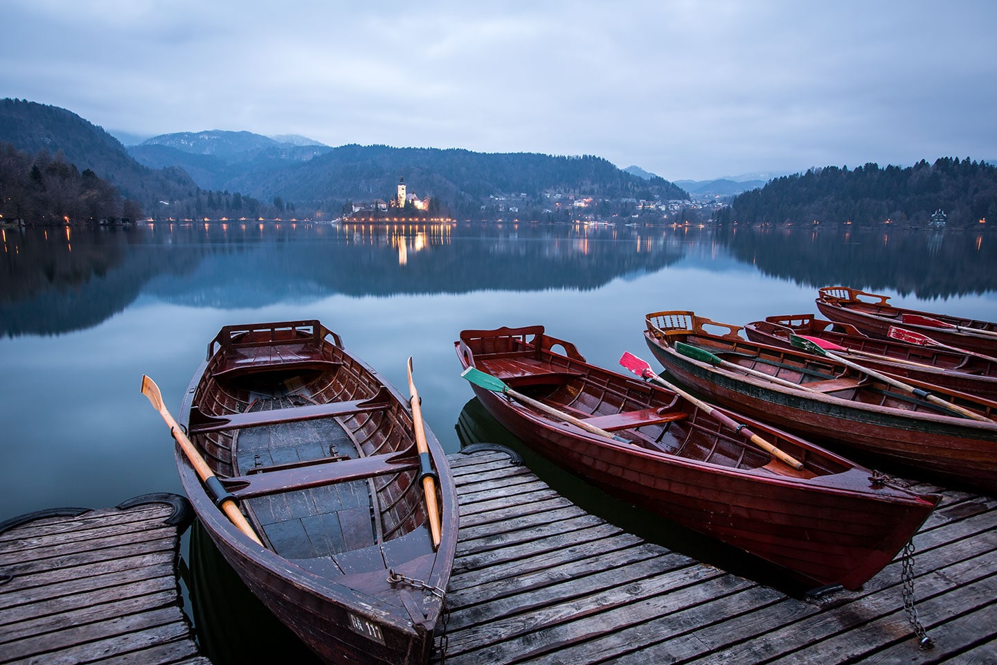 Lake Bled, Slovenia Wooden boats on the shore of Lake Bled, Slovenia