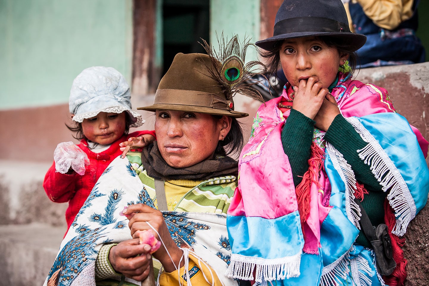 Ecuadorian family wearing traditional Panama hats
