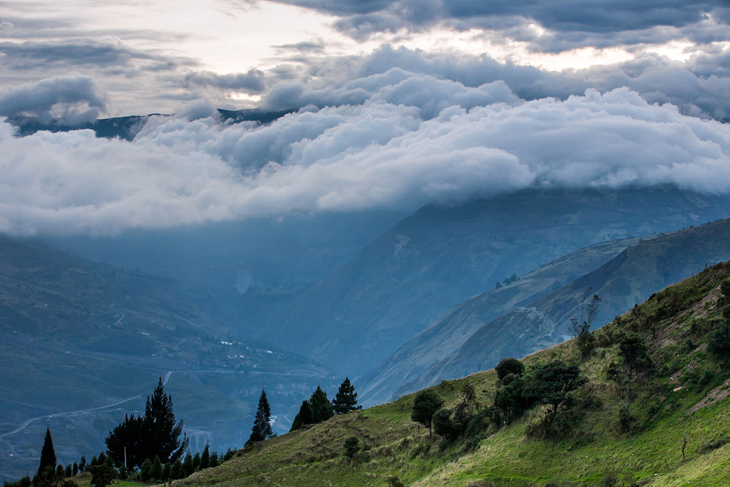 Clouds in a valley near Baños, Ecuador