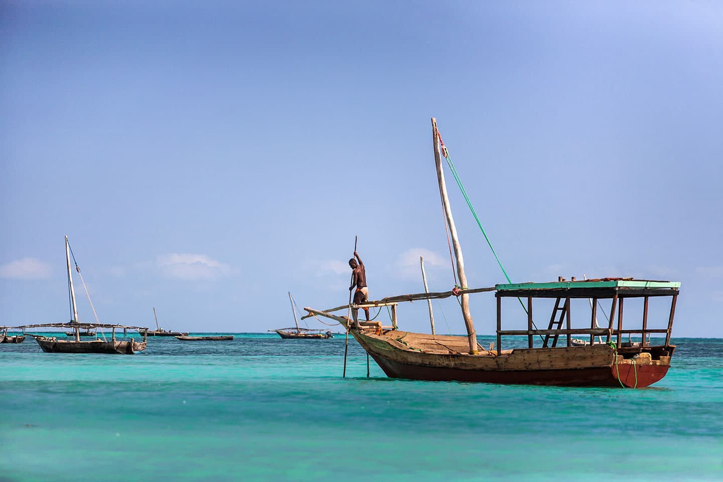 Nungwi, Zanzibar Travel photography of Local fishermen on wooden boats in Zanzibar