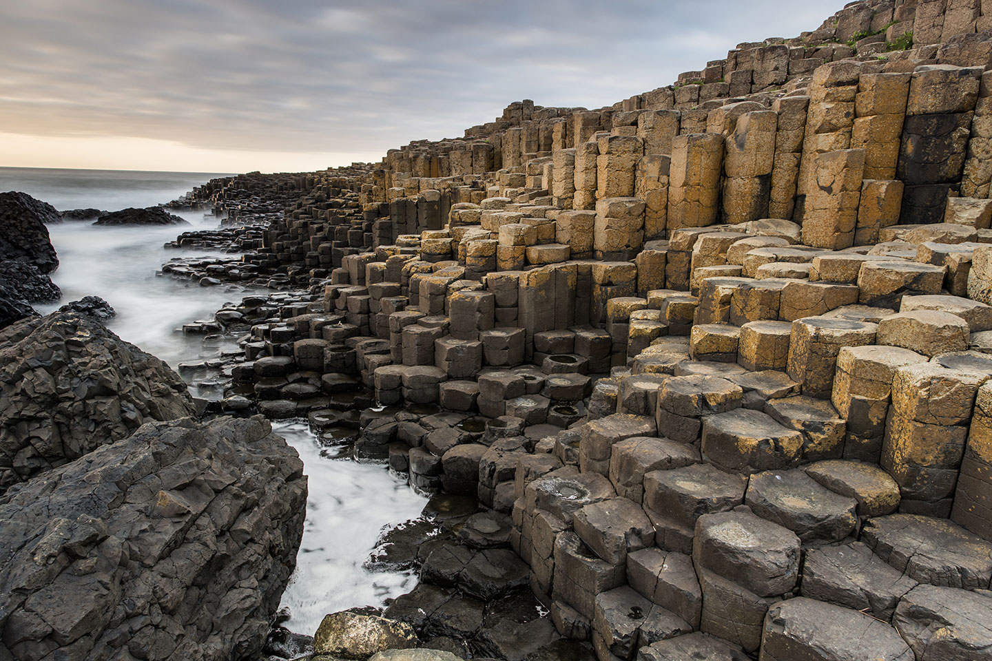 Stormy clouds over the basalt columns at Giant's Causeway, Northern Ireland