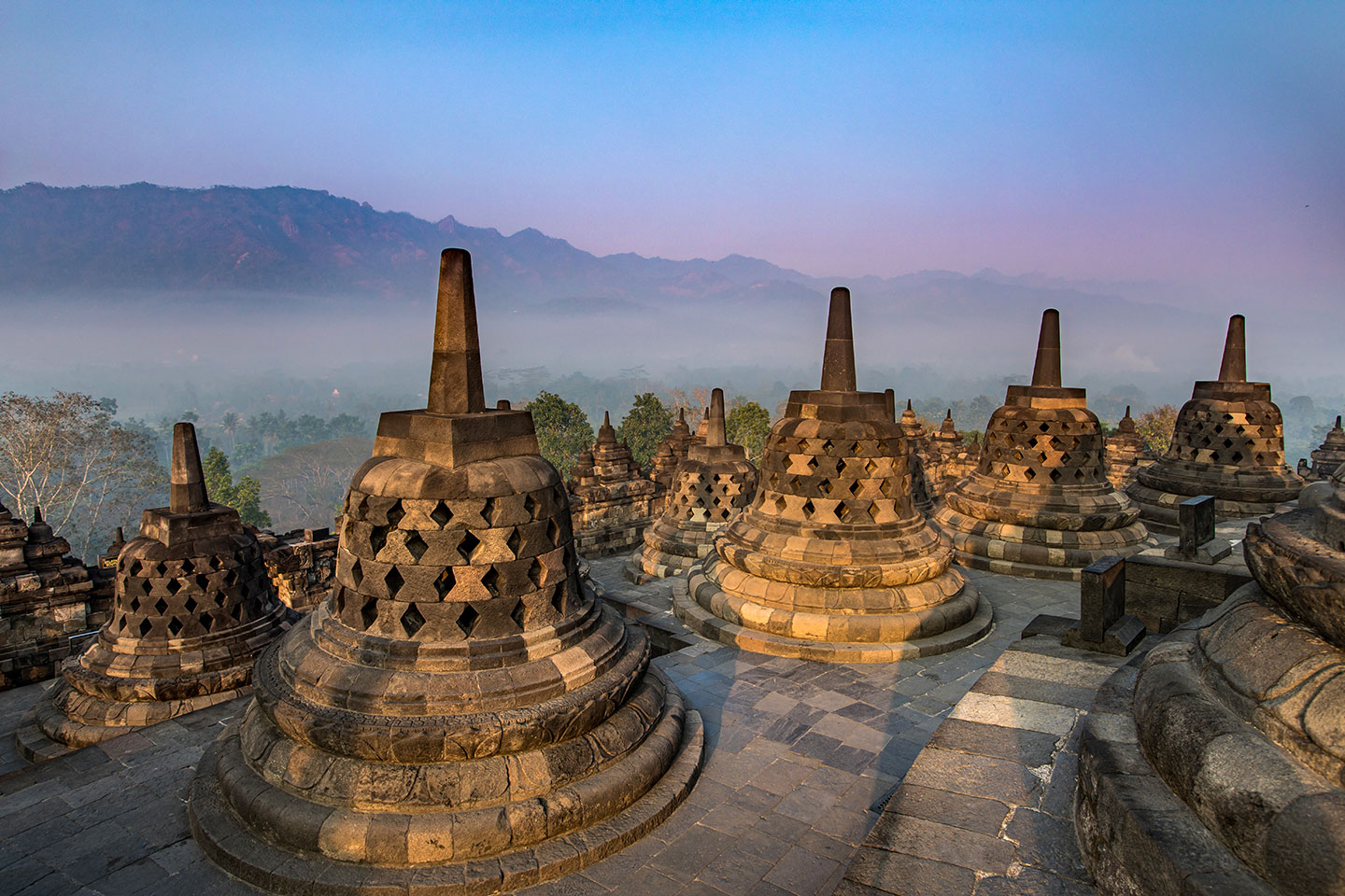 Giant bells of the Borobudur temple on the island of Java, Indonesia