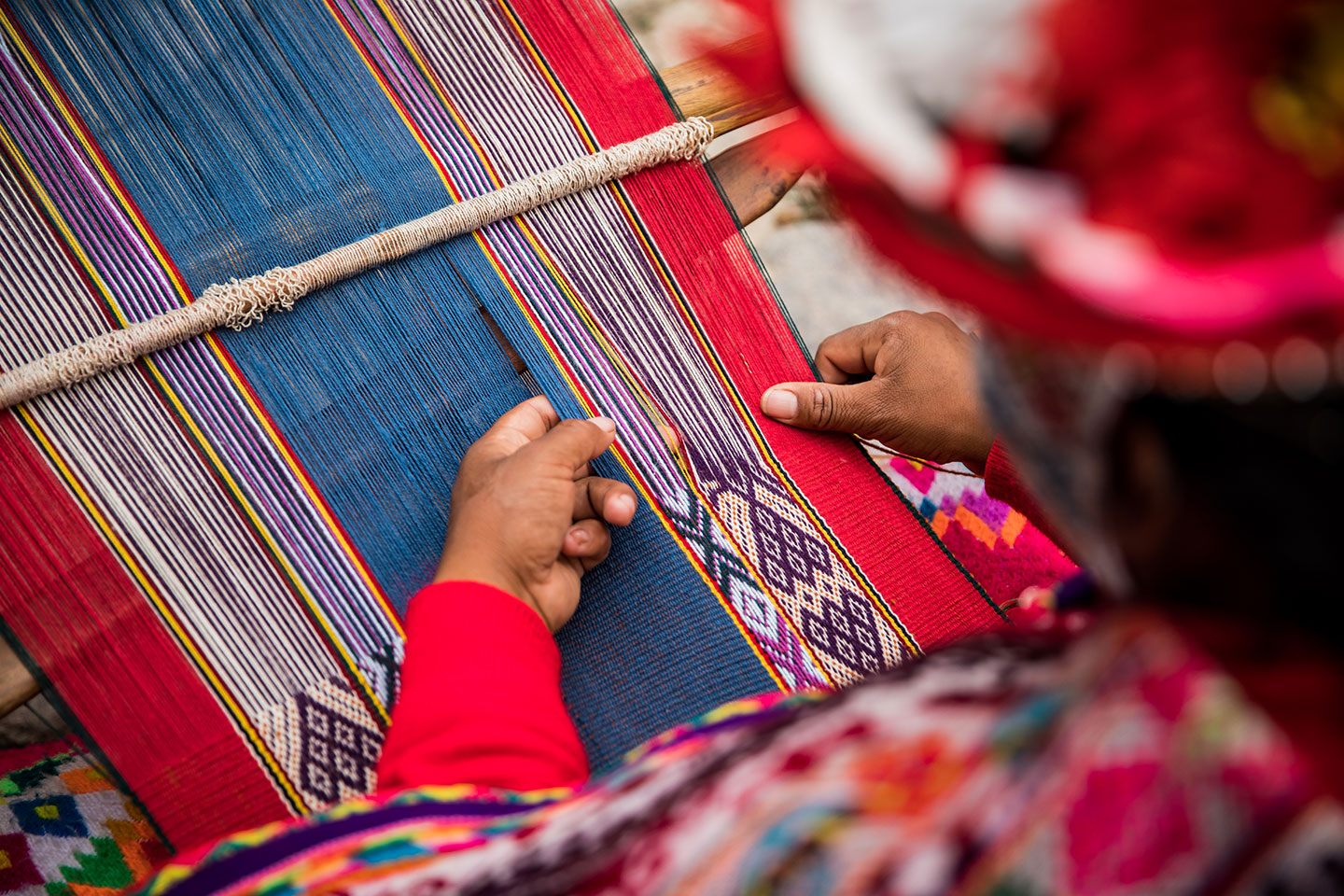 Cusco, Peru Woman weaving in the streets of Cusco, Peru