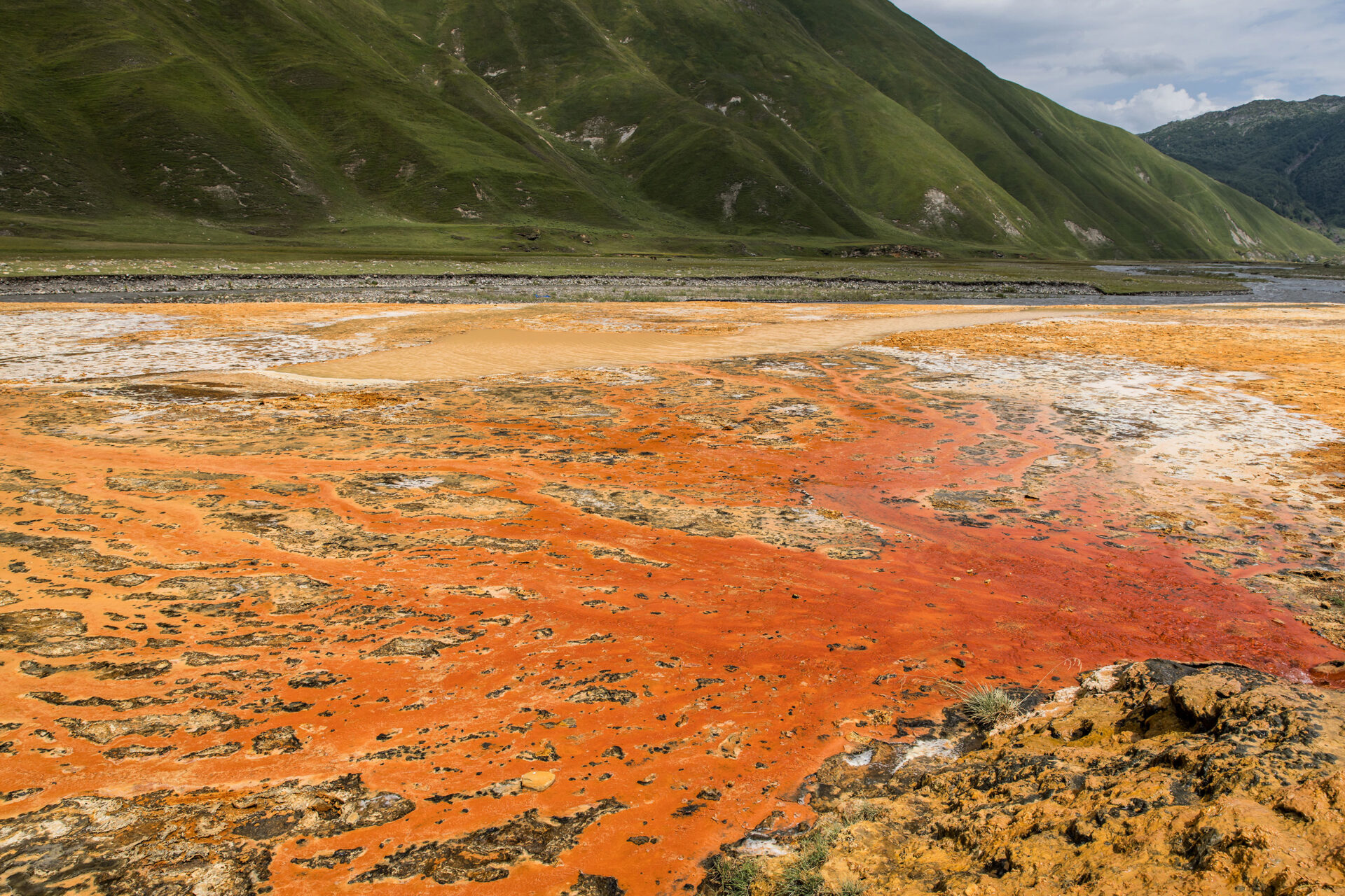 Red waters of the Truso Travertines in Georgia