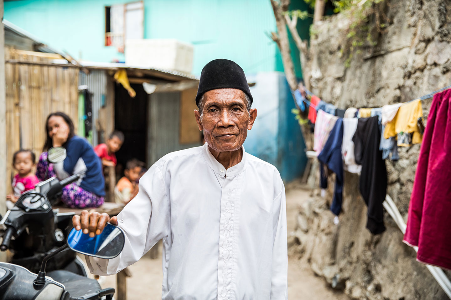 Local muslim man in the streets of Nusa Penida, Indonesia