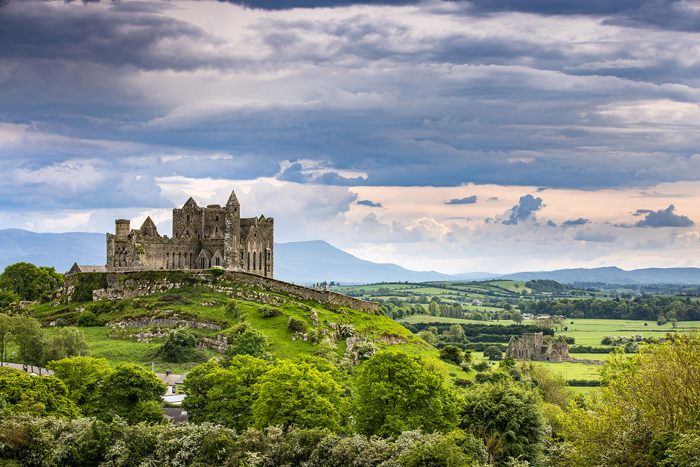 The rock of Cashel towering out over the green fields, Ireland