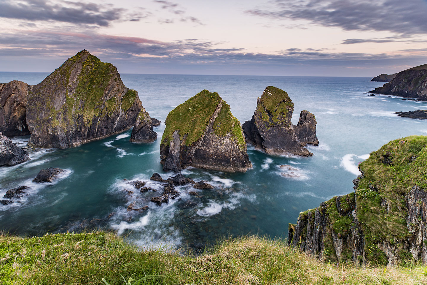 Dusk over the Nohoval cove in Ireland