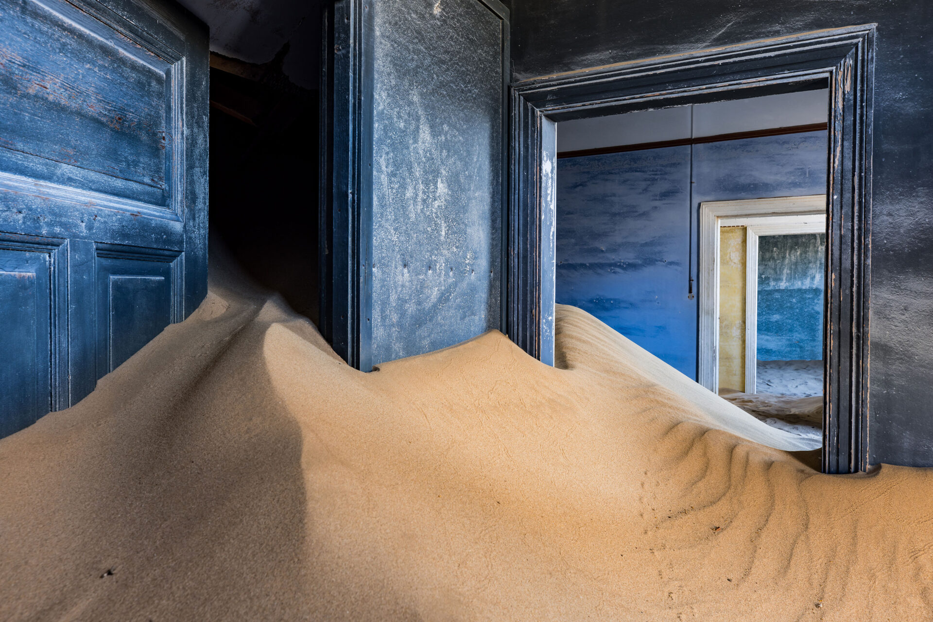 House filled with sand at the Kolmanskop abandoned village in Namibia
