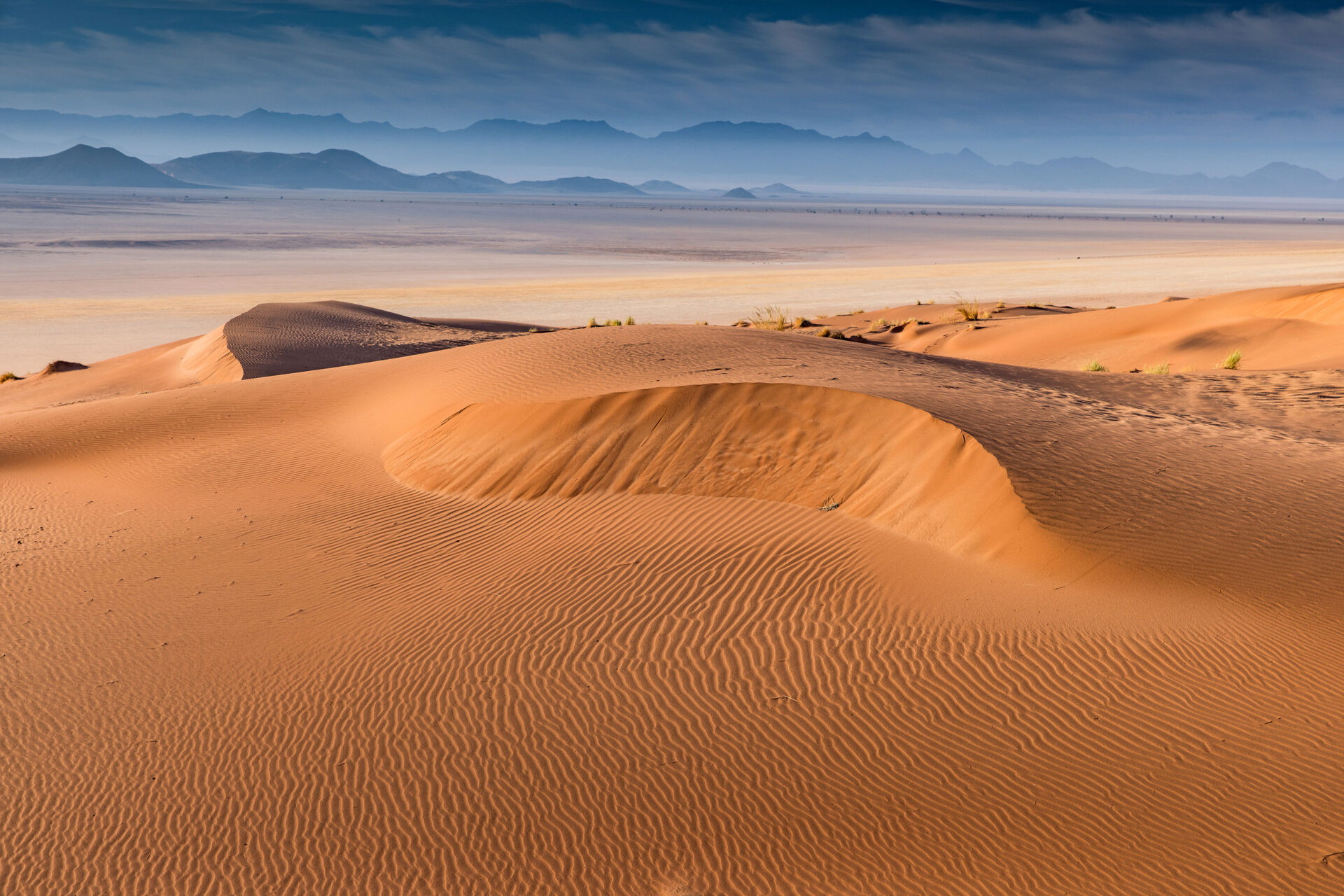 Sunrise in the Namib Desert with the endless sand dunes