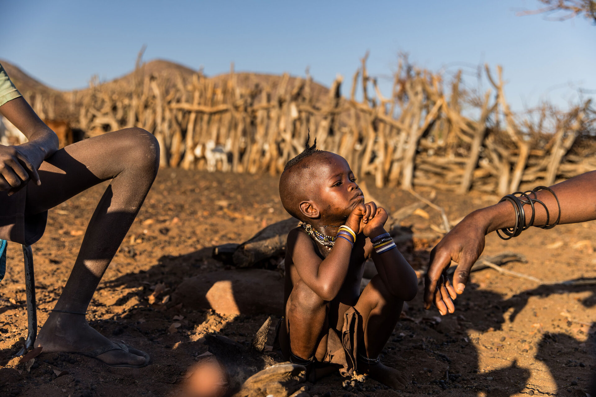 Young Himba boy in a Himba village in the Kunene region of Namibia