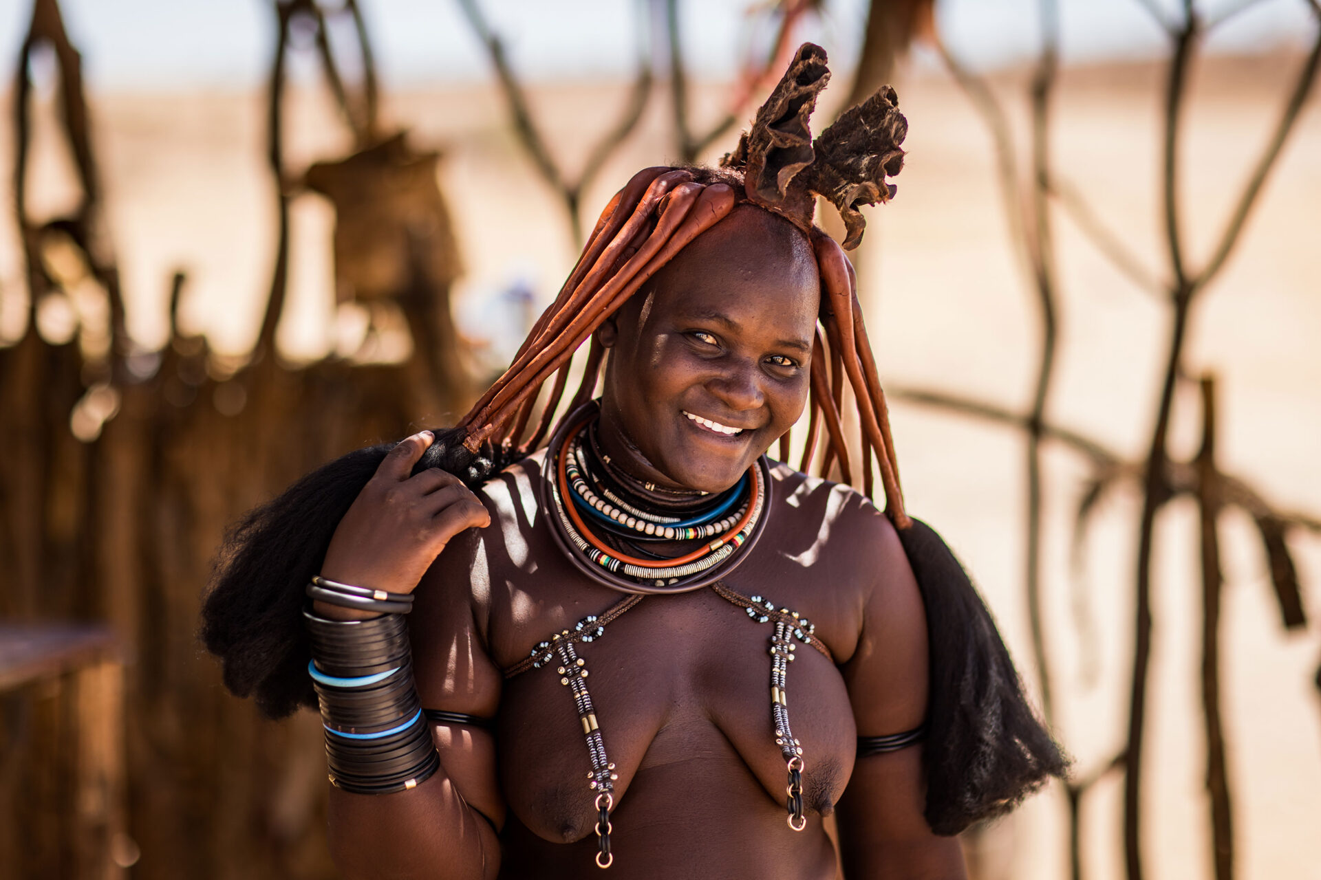 Young Himba girl smiling in Namibia