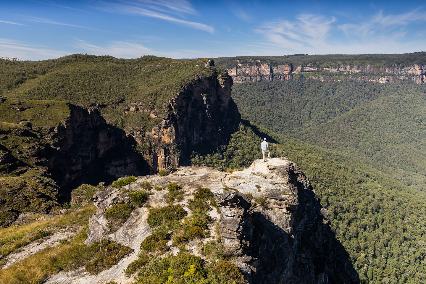 Hiker looking out during a hike at Lockleys Pylon in the Blue mountains