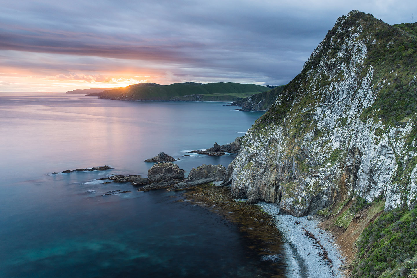 Nugget Point Sunset over Nugget Point in Otago, New Zealand