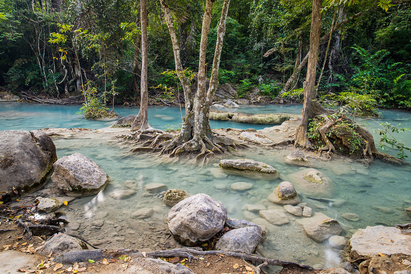 Erawan Falls Blue river at Erawan Falls National Park in Thailand